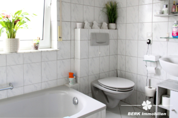 BERK Immobilien – Vermietete 4-Zimmer-Wohnung auf zwei Etagen in Sulzbach mit Garten und Terrasse - BERK Immobilien - Bad EG (104081)