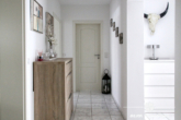 BERK Immobilien - Flur - BERK Immobilien – Vermietete 4-Zimmer-Wohnung auf zwei Etagen in Sulzbach mit Garten und Terrasse