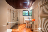 Badezimmer UG - BERK Immobilien – Einfamilienhaus zum Wohlfühlen mit Panoramablick & Waldrandlage in Klingenberg/Röllfeld