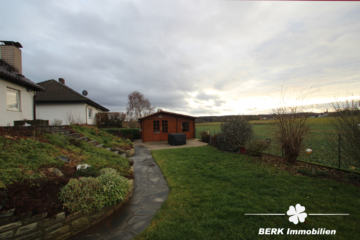 BERK Immobilien – Gepflegtes Einfamilienhaus mit schönem Garten in unverbaubarer Feldrandlage - Garten (109804)