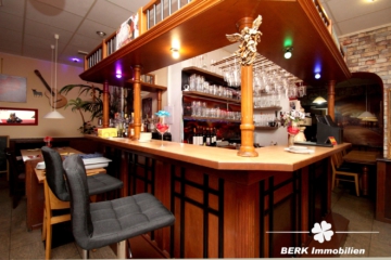BERK Immobilien – Attraktive Renditeimmobilie: Voll vermietetes Wohn- und Geschäftshaus in zentraler Stadtlage - Theke Gewerbeeinheit (104160)