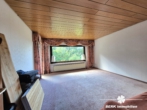 Wohnzimmer EG - *RESERVIERT* BERK Immobilien – Fernblick vom Feinsten: charmantes ZFH in Johannesberg