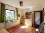 Kinderzimmer - BERK Immobilien – Charmanter Bungalow mit Gartenidylle und viel Potenzial in Sulzbach am Main