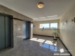 Treppenhaus / Aufzüge - BERK Immobilien – modernisierte 4-Zimmer-Whg mit Aussicht & optionalem eigenen Gartengrundstück