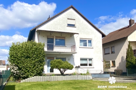 BERK Immobilien – Familienfreundliches Zweifamilienhaus mit sonnigem Grundstück und vielfältigsten Möglichkeiten - Titelbild (118874)