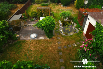 VERKAUFT – BERK Immobilien – Siedlungshaus mit Anbau und großem Garten in Hainburg zu verkaufen - BERK Immobilien - Garten - Blick vom Balkon (104789)