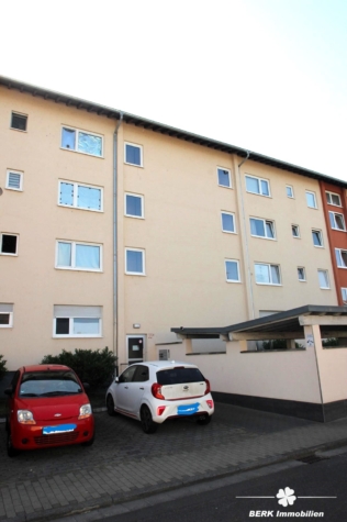 BERK Immobilien – Top-Kapitalanlage mit 4,4 % Rendite – vermietete ETW in Feldrandlage - Hausansicht vorne (125124)