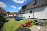 Garten - BERK Immobilien – Top gepflegtes ZFH mit gemütlichem Garten in schöner Lage von Laufach