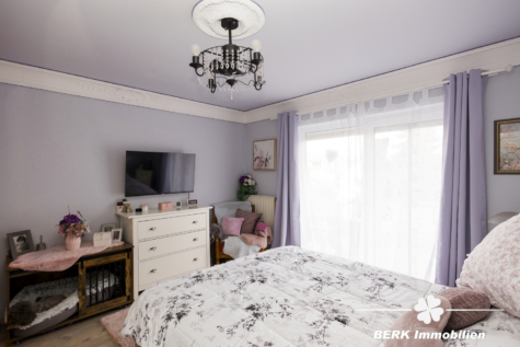 BERK Immobilien – gemütliche 3-Zimmer-Erdgeschosswohnung mit großer Terrasse, Balkon & Gartenzugang - Schlafzimmer (116666)