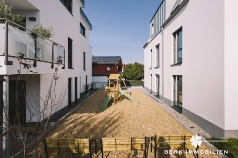 BERK Immobilien – 4-Zimmer-Neubau-Erdgeschosswohnung mit sonniger Terrasse in 1a Lage von Alzenau - Spielplatz (130457)