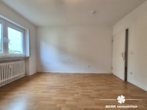 Zimmer III - BERK Immobilien – gepflegte und gut geschnittene 4-Zimmer-ETW in zentraler Lage von Kleinostheim