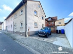 Hausansicht - BERK Immobilien – Großzügiges Zweifamilienhaus mit Garten, Hof und Doppelgarage