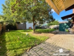 Garten - BERK Immobilien – Großzügiges Zweifamilienhaus mit Garten, Hof und Doppelgarage