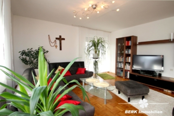 BERK Immobilien – Gepflegte 2-Zimmer-ETW mit großzügiger Terrasse, Garten und Garage in Stockstadt - Wohnbereich (107126)