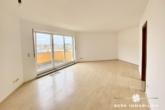Wohn-Ess-Zimmer mit Balkon