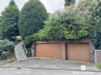 Garagen - BERK Immobilien – Privates Wohnidyll im Grünen – Stilvoll leben auf parkähnlichem Grundstück