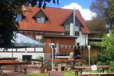 BERK Immobilien – Besonderes EFH mit großem Wintergarten und Garten in Eschau-Sommerau zu verkaufen - Rückseite mit Biergarten (123130)