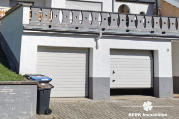 BERK Immobilien – Vermietetes Dreifamilienhaus als Kapitalanlage in Leidersbach - Garagen (109118)