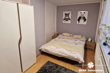 BERK Immobilien – Vermietetes Dreifamilienhaus als Kapitalanlage in Leidersbach - Schlafzimmer EG (109100)