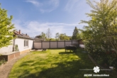 Garten - BERK Immobilien – Gepflegtes 3-Familienhaus mit großem Grundstück und vielseitigen Möglichkeiten