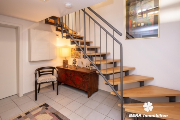 BERK Immobilien – Stilvolle DHH mit Gartenidylle und Wellnessbereich in Seligenstadt – Ausbaupotential - Flur im Keller (117394)