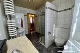 Badzimmer EG - BERK Immobilien – Vielseitiges Mehrfamilienhaus mit Potenzial in Laudenbach