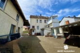 Innenhof - BERK Immobilien – Vielseitiges Mehrfamilienhaus mit Potenzial in Laudenbach