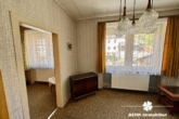 Wohnzimmer OG - BERK Immobilien – Vielseitiges Mehrfamilienhaus mit Potenzial in Laudenbach
