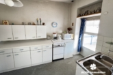 Küche OG - BERK Immobilien – Vielseitiges Mehrfamilienhaus mit Potenzial in Laudenbach
