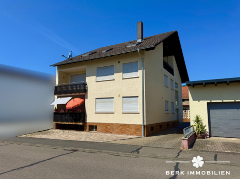 BERK Immobilien – Attraktives Zweifamilienhaus mit zusätzlichem Potenzial im Dachgeschoss - Hausansicht (127305)