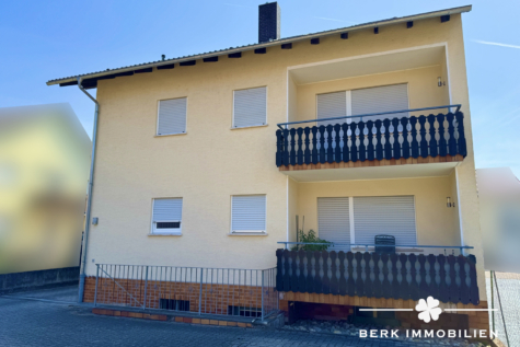 BERK Immobilien – Attraktives Zweifamilienhaus mit zusätzlichem Potenzial im Dachgeschoss - Rückseite (127306)