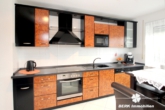 Küche - BERK Immobilien – Charmante 2-Zimmer-ETW mit großzügiger Terrasse, Garten, Garage + Dachboden