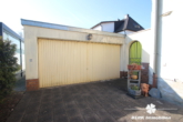 Garage - BERK Immobilien – Charmante 2-Zimmer-ETW mit großzügiger Terrasse, Garten, Garage + Dachboden