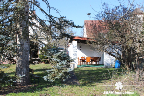 BERK Immobilien – Großzügiges Siedlungshaus mit Anbau & viel Potenzial in ruhiger Lage - Überdachter Freisitz (123422)