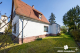 Außenansicht - BERK Immobilien – Großzügiges Siedlungshaus mit Anbau & viel Potenzial in ruhiger Lage