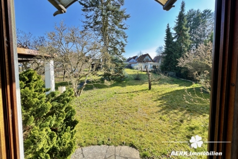 BERK Immobilien – Großzügiges Siedlungshaus mit Anbau & viel Potenzial in ruhiger Lage - Aussicht Wohnzimmer (123429)