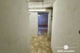 Zugang Keller - BERK Immobilien – Großzügiges Siedlungshaus mit Anbau & viel Potenzial in ruhiger Lage