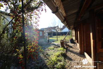 BERK Immobilien – Familienfreundliches Haus mit viel Platz und vielseitigem Nebengebäude - Garten (110145)