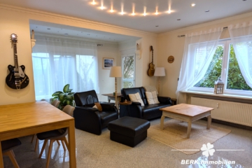 BERK Immobilien – Charmante Erdgeschosswohnung mit Gartenidylle in Daxberg - Wohnzimmer (111395)