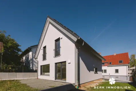 BERK Immobilien – Neuwertiges Einfamilienhaus zum Wohlfühlen in Klingenberg-Trennfurt - Außenansicht (131785)