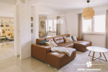 BERK Immobilien – einzigartige Luxusimmobilie: Naturverbunden und hochmodern in ruhiger Lage von Großostheim - Wohnzimmer (104460)