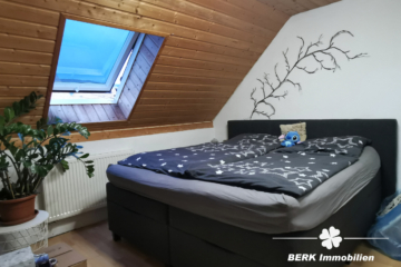 BERK Immobilien – Zwei Häuser zum Preis von einem – Wohnen u./o. vermieten mit Rendite in Eschau - Schlafzimmer linkes Haus (117311)