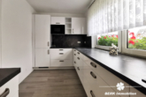 Küche EG - BERK Immobilien – Siedlungshaus mit Garten und Garage in Goldbach am Kugelberg zu verkaufen