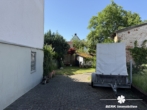 Einfahrt - BERK Immobilien – Baugrundstück mit Südausrichtung und zurückgesetzter, zentraler Lage in Haibach