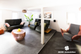 Wohnzimmer - BERK Immobilien – charmantes Wohnhaus und Gewerbe unter einem Dach in der Miltenberger Altstadt