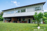Außenansicht - KI bearbeitet - BERK Immobilien – Leben in Grünen: Charmantes Einfamilienhaus mit großem Garten in Lützelbach