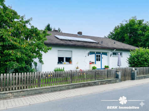 BERK Immobilien – Leben in Grünen: Charmantes Einfamilienhaus mit großem Garten in Lützelbach - Außenansicht - KI bearbeitet (119572)