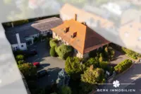 Immobilienensemble mit Wohnen und Gewerbe