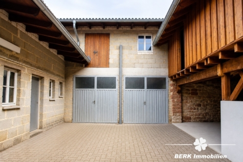 BERK Immobilien – Vielseitiges Zweifamilienhaus mit viel Platz in Mömlingen - Hof mit Nebengebäude und Garage KI-Generiert (122596)