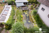 OG Blick auf den Garten - *VERKAUFT* BERK Immobilien – kleine Oase mit viel Platz: top gepflegtes ZFH in Mainaschaff